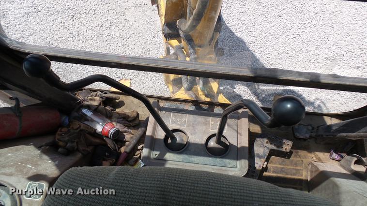 image for item DB9302 1997 John Deere 310E backhoe