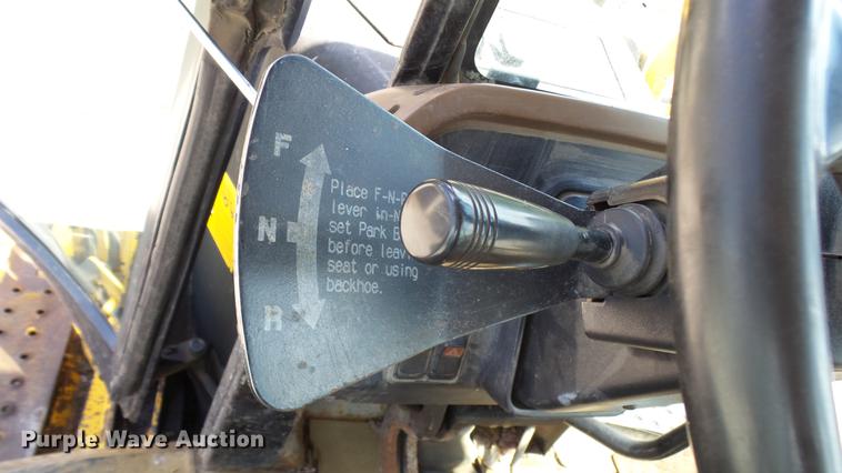 image for item DB9302 1997 John Deere 310E backhoe