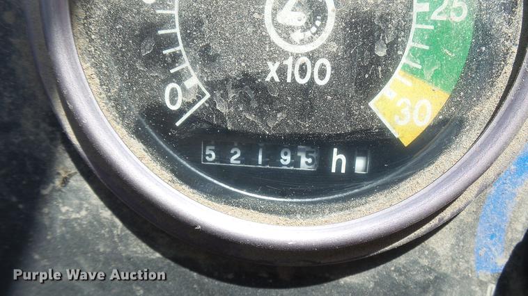 image for item DB9302 1997 John Deere 310E backhoe