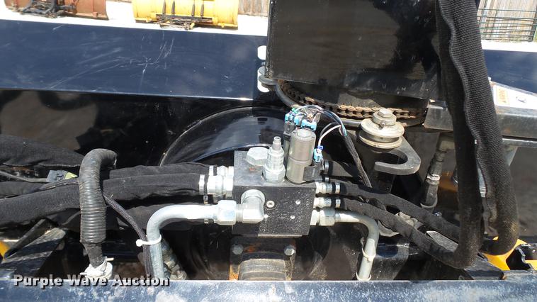 image for item DD7270 Snow blower and concrete bucket skid steer attachments