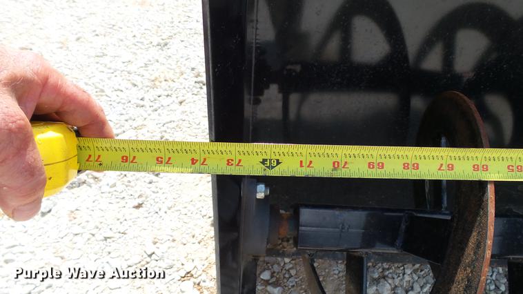 image for item DD7270 Snow blower and concrete bucket skid steer attachments