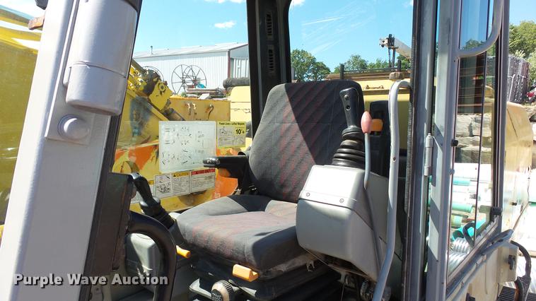 image for item DD7290 1998 New Holland EC600 excavator