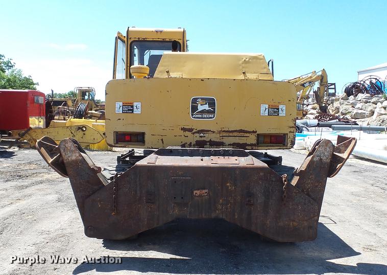 image for item DD7291 1989 John Deere 495D rubber tired excavator