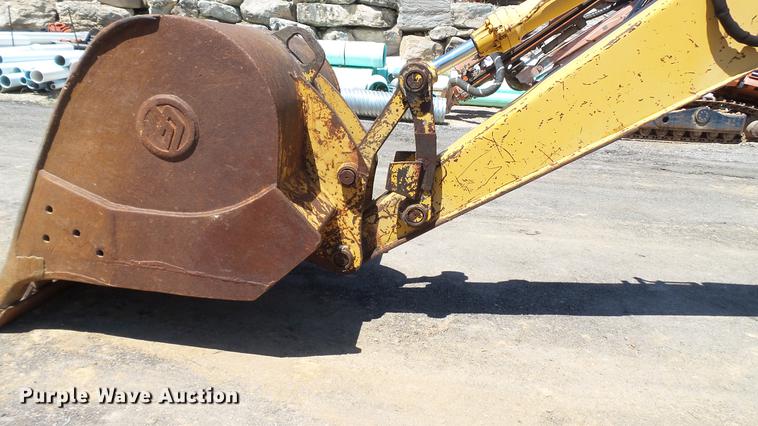 image for item DD7291 1989 John Deere 495D rubber tired excavator