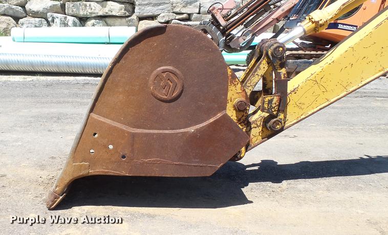 image for item DD7291 1989 John Deere 495D rubber tired excavator