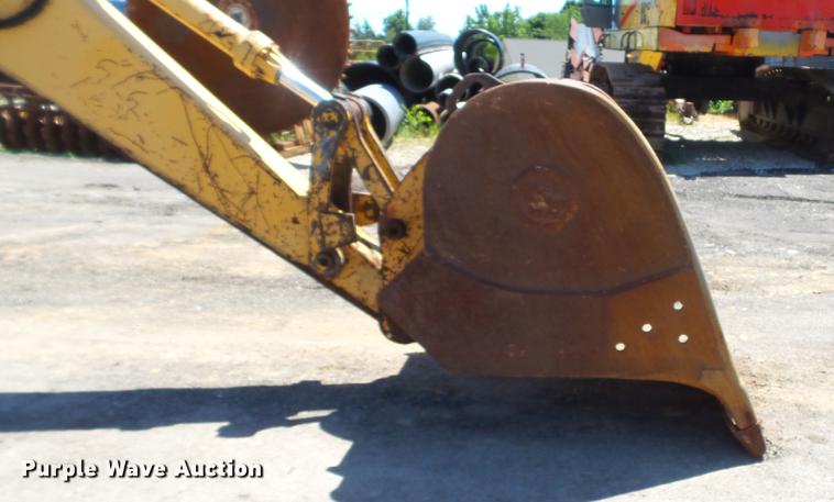 image for item DD7291 1989 John Deere 495D rubber tired excavator