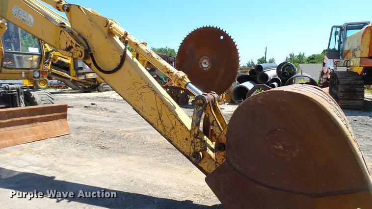 image for item DD7291 1989 John Deere 495D rubber tired excavator