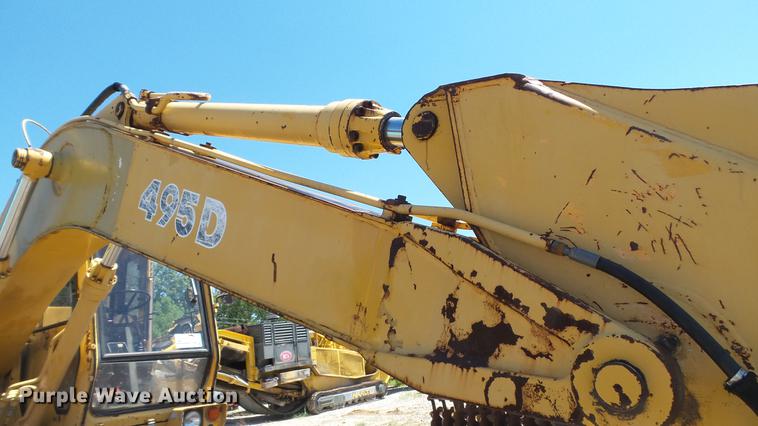 image for item DD7291 1989 John Deere 495D rubber tired excavator