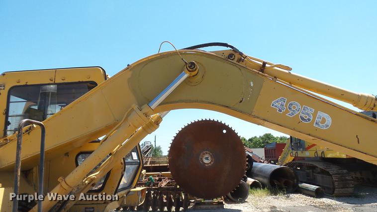 image for item DD7291 1989 John Deere 495D rubber tired excavator