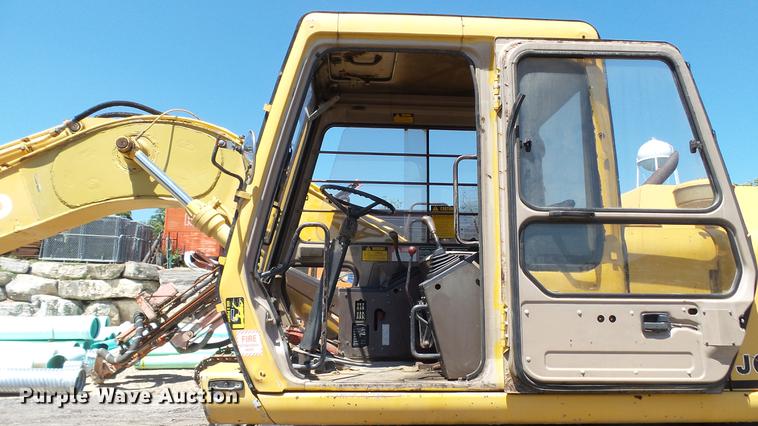 image for item DD7291 1989 John Deere 495D rubber tired excavator