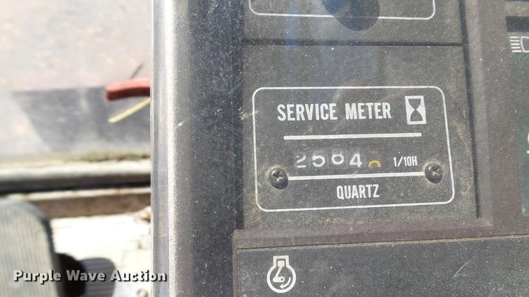 image for item DD7291 1989 John Deere 495D rubber tired excavator