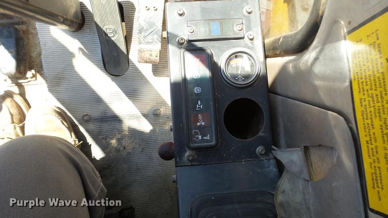 image for item DD7291 1989 John Deere 495D rubber tired excavator