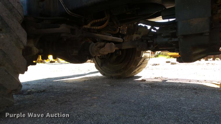 image for item DD7291 1989 John Deere 495D rubber tired excavator