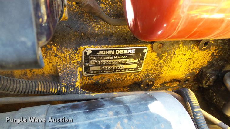 image for item DD7291 1989 John Deere 495D rubber tired excavator