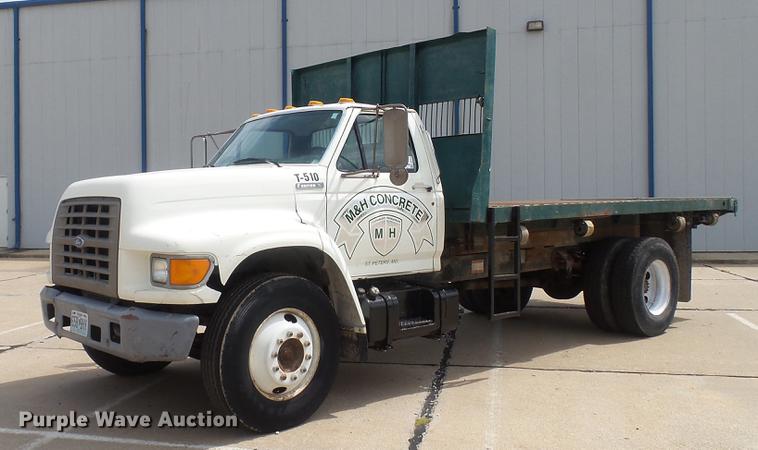 image for item DD7314 1995 Ford F700 flat dump bed truck