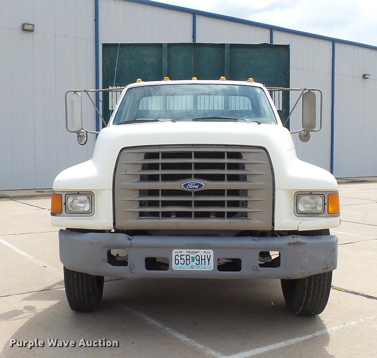 image for item DD7314 1995 Ford F700 flat dump bed truck