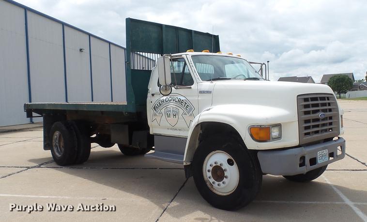 image for item DD7314 1995 Ford F700 flat dump bed truck