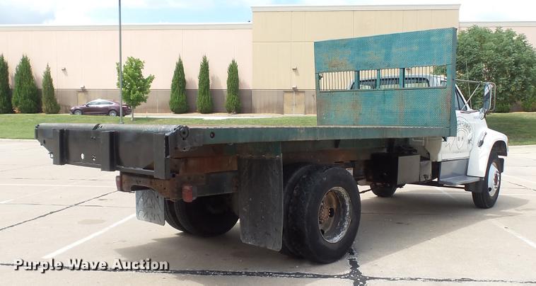 image for item DD7314 1995 Ford F700 flat dump bed truck