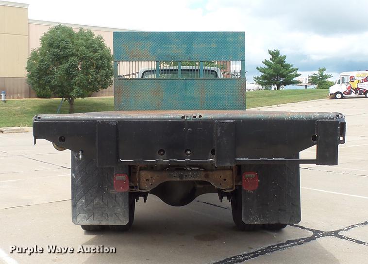 image for item DD7314 1995 Ford F700 flat dump bed truck