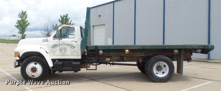 image for item DD7314 1995 Ford F700 flat dump bed truck