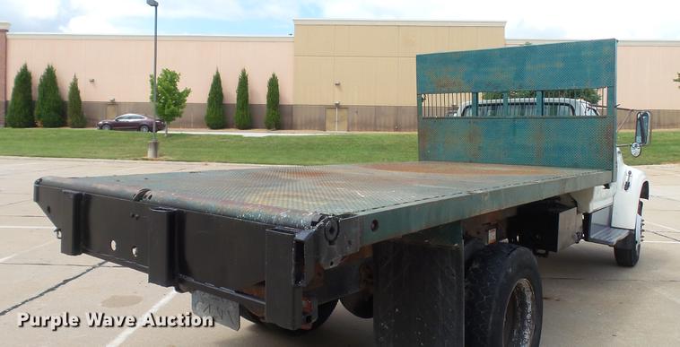image for item DD7314 1995 Ford F700 flat dump bed truck