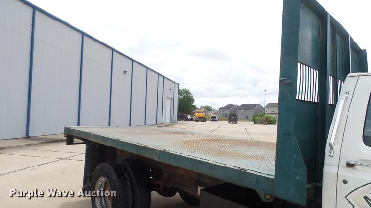 image for item DD7314 1995 Ford F700 flat dump bed truck