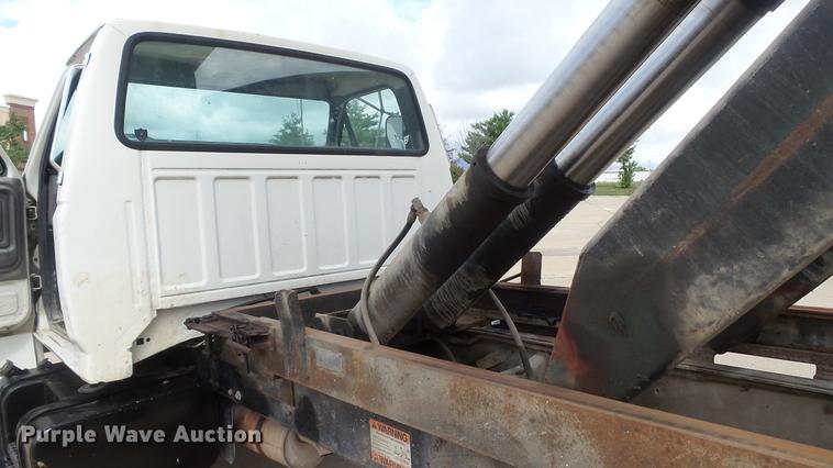 image for item DD7314 1995 Ford F700 flat dump bed truck