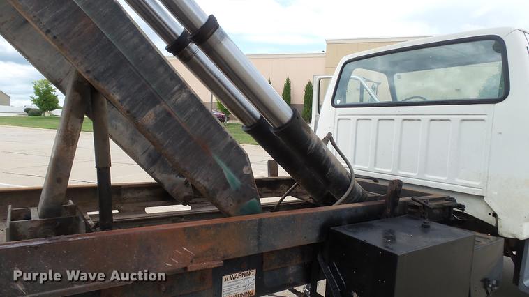 image for item DD7314 1995 Ford F700 flat dump bed truck