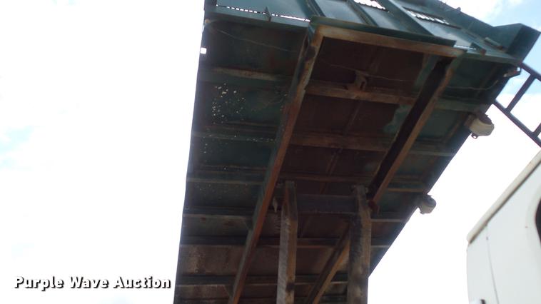 image for item DD7314 1995 Ford F700 flat dump bed truck