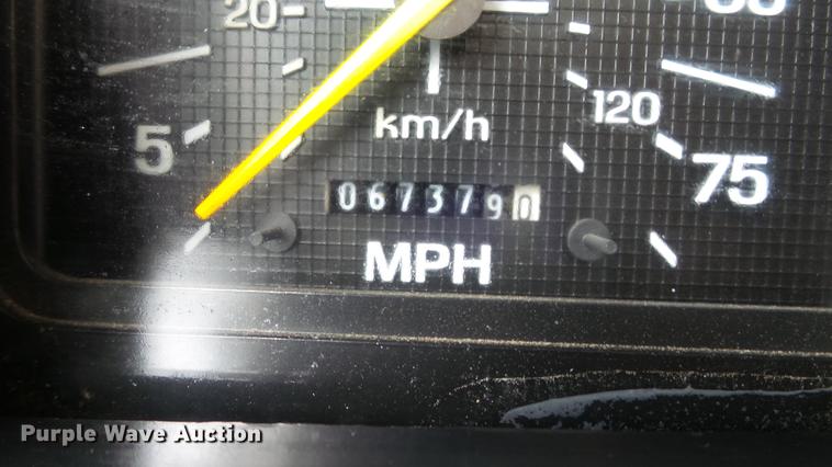 image for item DD7314 1995 Ford F700 flat dump bed truck