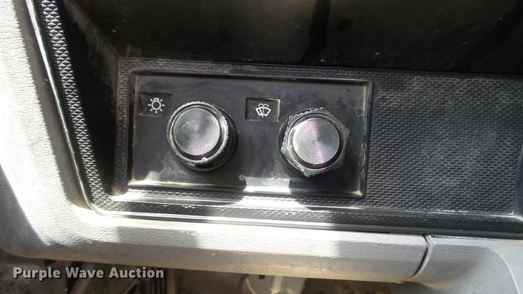 image for item DD7314 1995 Ford F700 flat dump bed truck