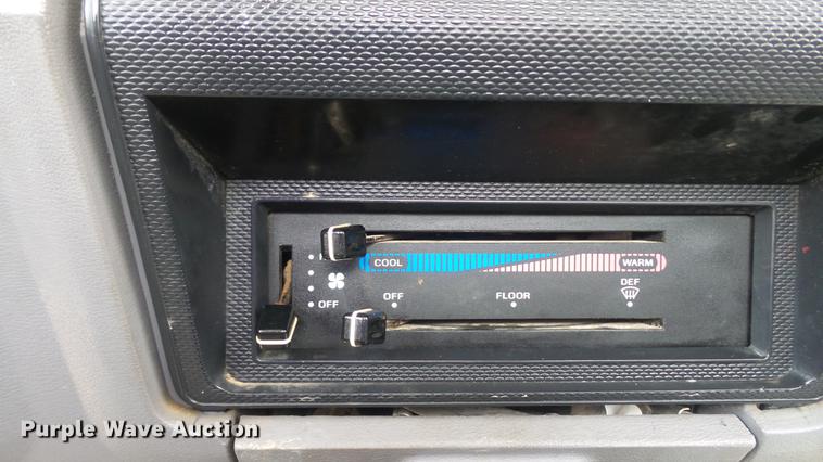 image for item DD7314 1995 Ford F700 flat dump bed truck