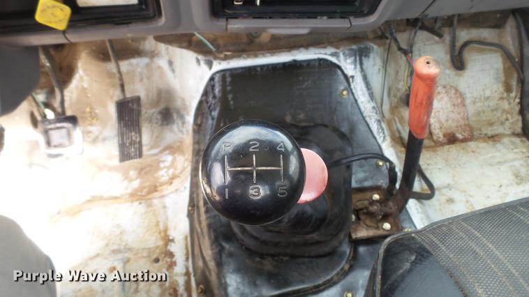 image for item DD7314 1995 Ford F700 flat dump bed truck