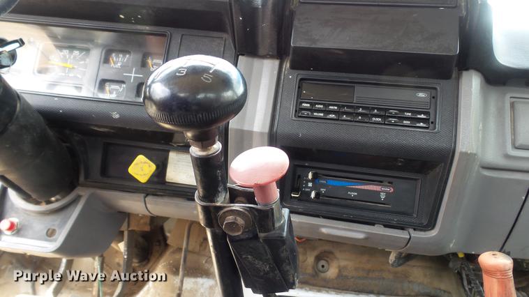 image for item DD7314 1995 Ford F700 flat dump bed truck