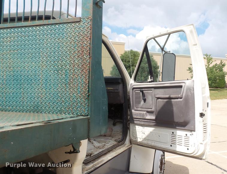 image for item DD7314 1995 Ford F700 flat dump bed truck