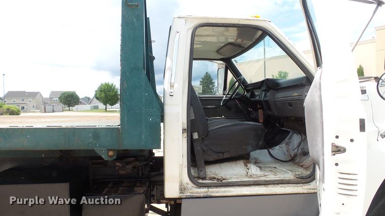 image for item DD7314 1995 Ford F700 flat dump bed truck