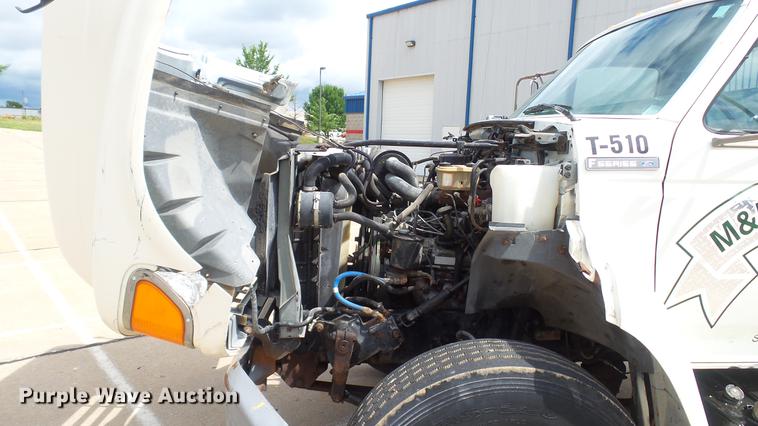 image for item DD7314 1995 Ford F700 flat dump bed truck