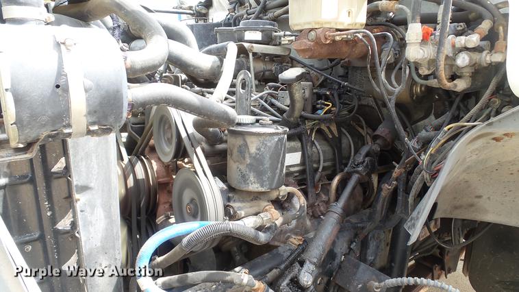 image for item DD7314 1995 Ford F700 flat dump bed truck