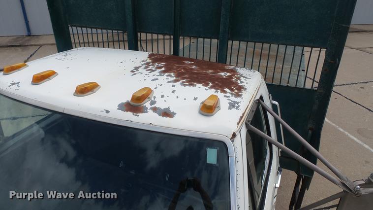 image for item DD7314 1995 Ford F700 flat dump bed truck