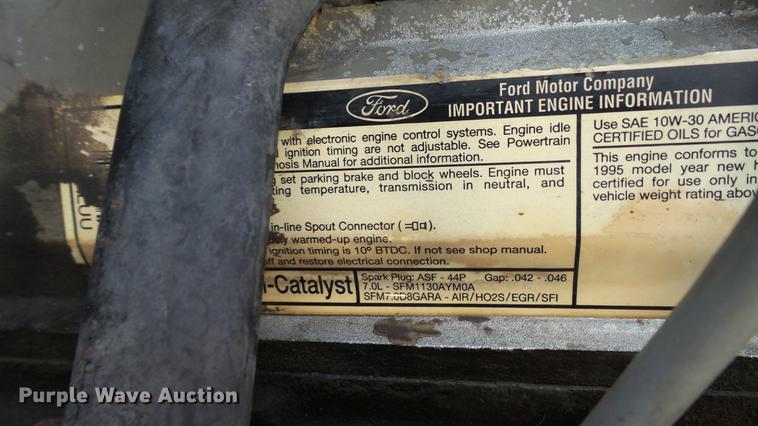 image for item DD7314 1995 Ford F700 flat dump bed truck