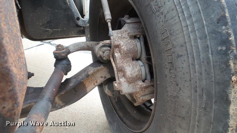 image for item DD7314 1995 Ford F700 flat dump bed truck