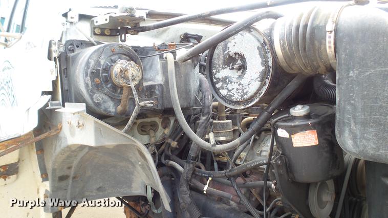 image for item DD7314 1995 Ford F700 flat dump bed truck