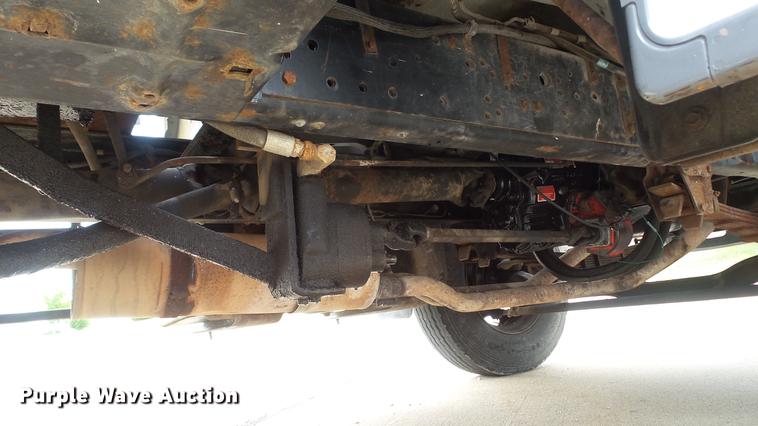 image for item DD7314 1995 Ford F700 flat dump bed truck