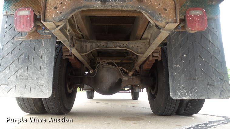 image for item DD7314 1995 Ford F700 flat dump bed truck