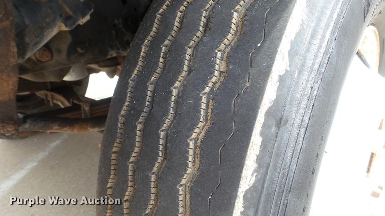 image for item DD7314 1995 Ford F700 flat dump bed truck