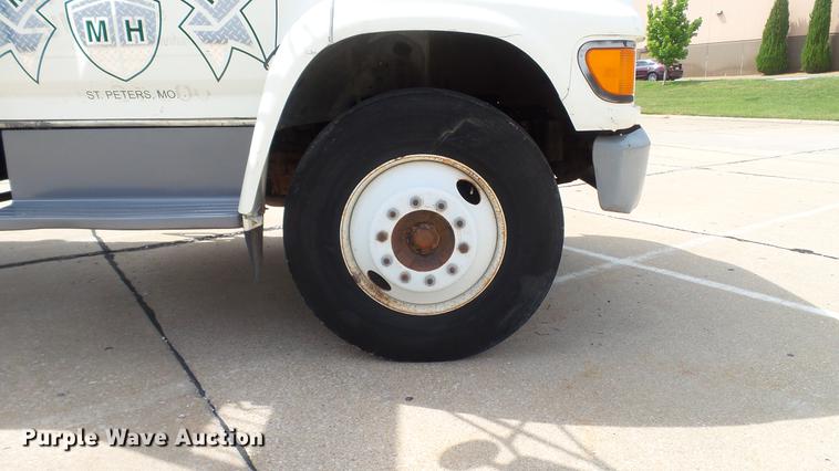 image for item DD7314 1995 Ford F700 flat dump bed truck