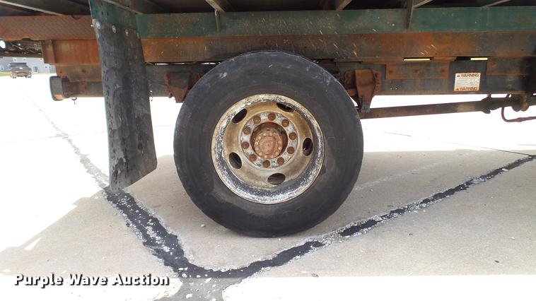 image for item DD7314 1995 Ford F700 flat dump bed truck