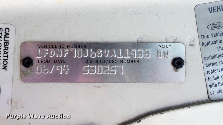 image for item DD7314 1995 Ford F700 flat dump bed truck