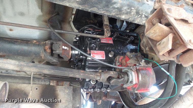 image for item DD7314 1995 Ford F700 flat dump bed truck