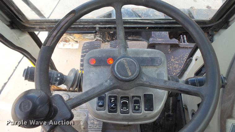 image for item DD7315 2005 Hyundai Robex 170W-7 rubber tire excavator